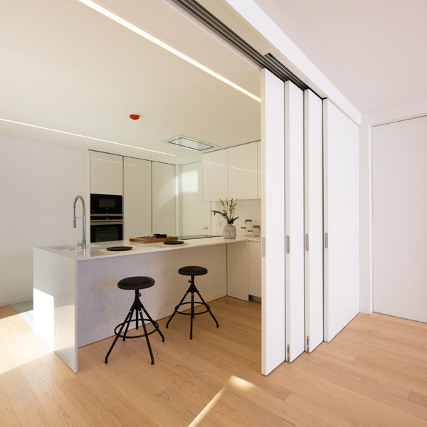 Sliding door system with built-in track